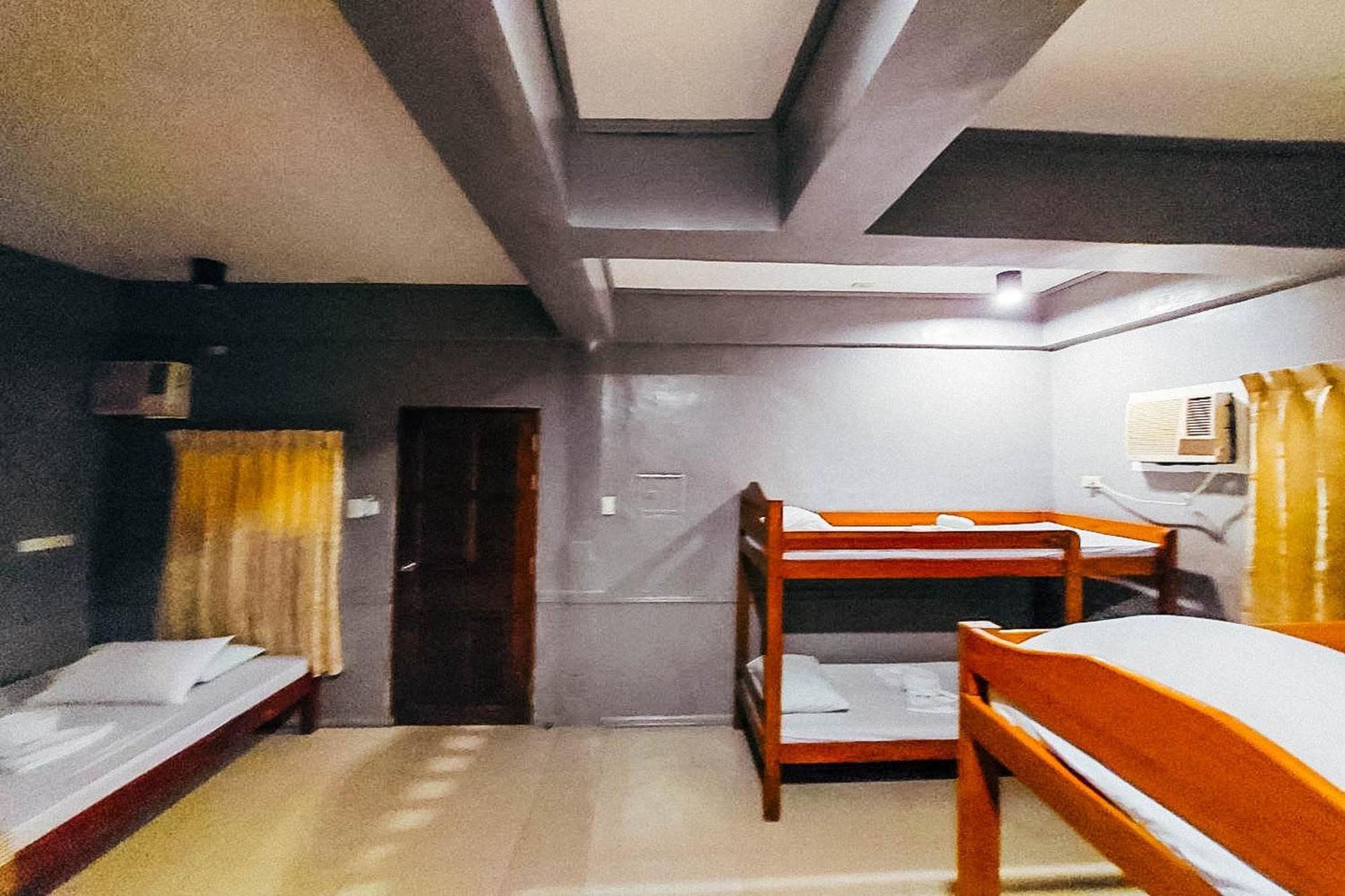 Mbg Travellers Inn Powered By Cocotel بويرتو برينسيسا الغرفة الصورة