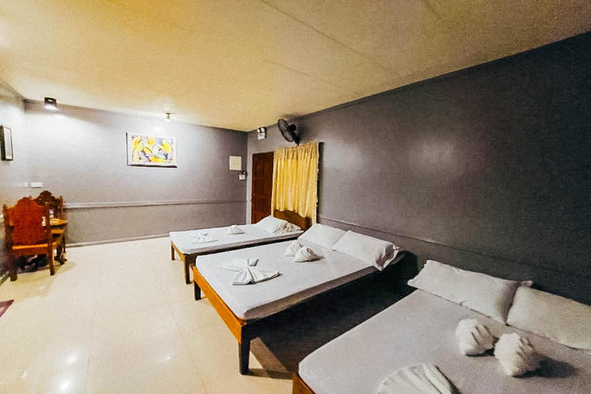 Mbg Travellers Inn Powered By Cocotel بويرتو برينسيسا الغرفة الصورة
