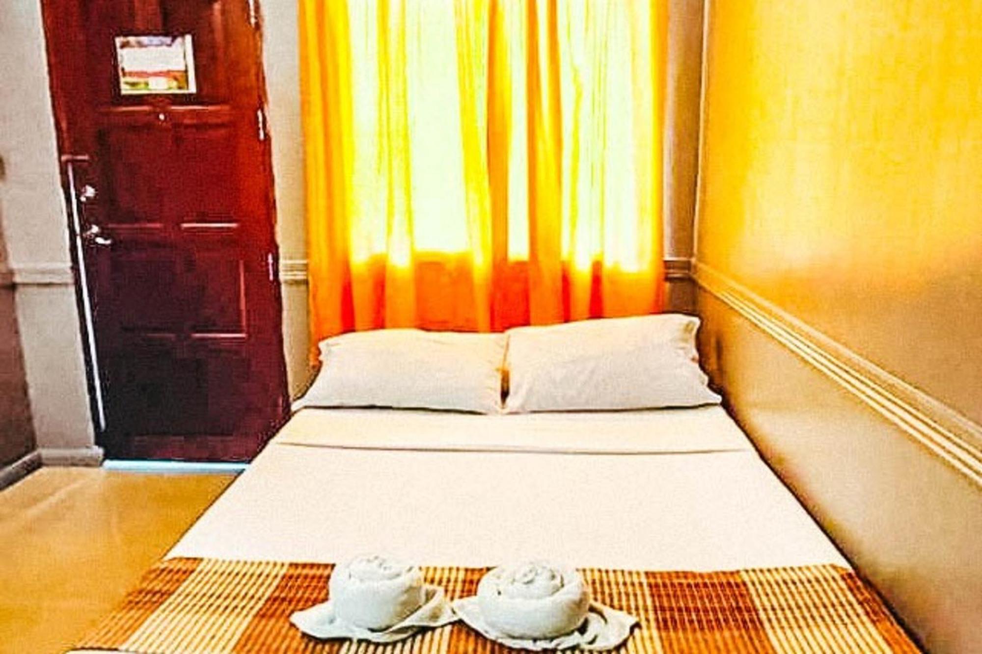 Mbg Travellers Inn Powered By Cocotel بويرتو برينسيسا الغرفة الصورة