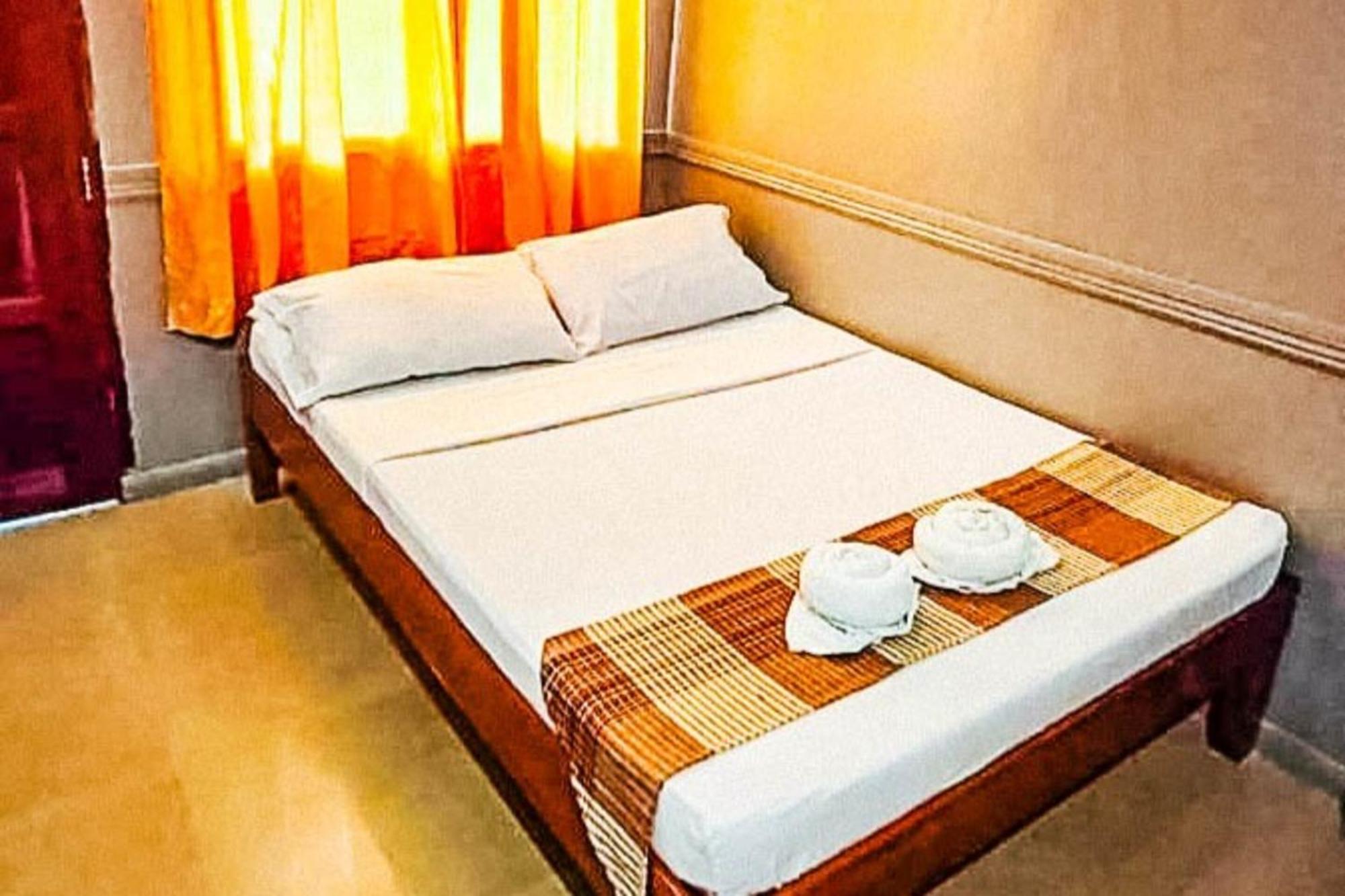 Mbg Travellers Inn Powered By Cocotel بويرتو برينسيسا الغرفة الصورة
