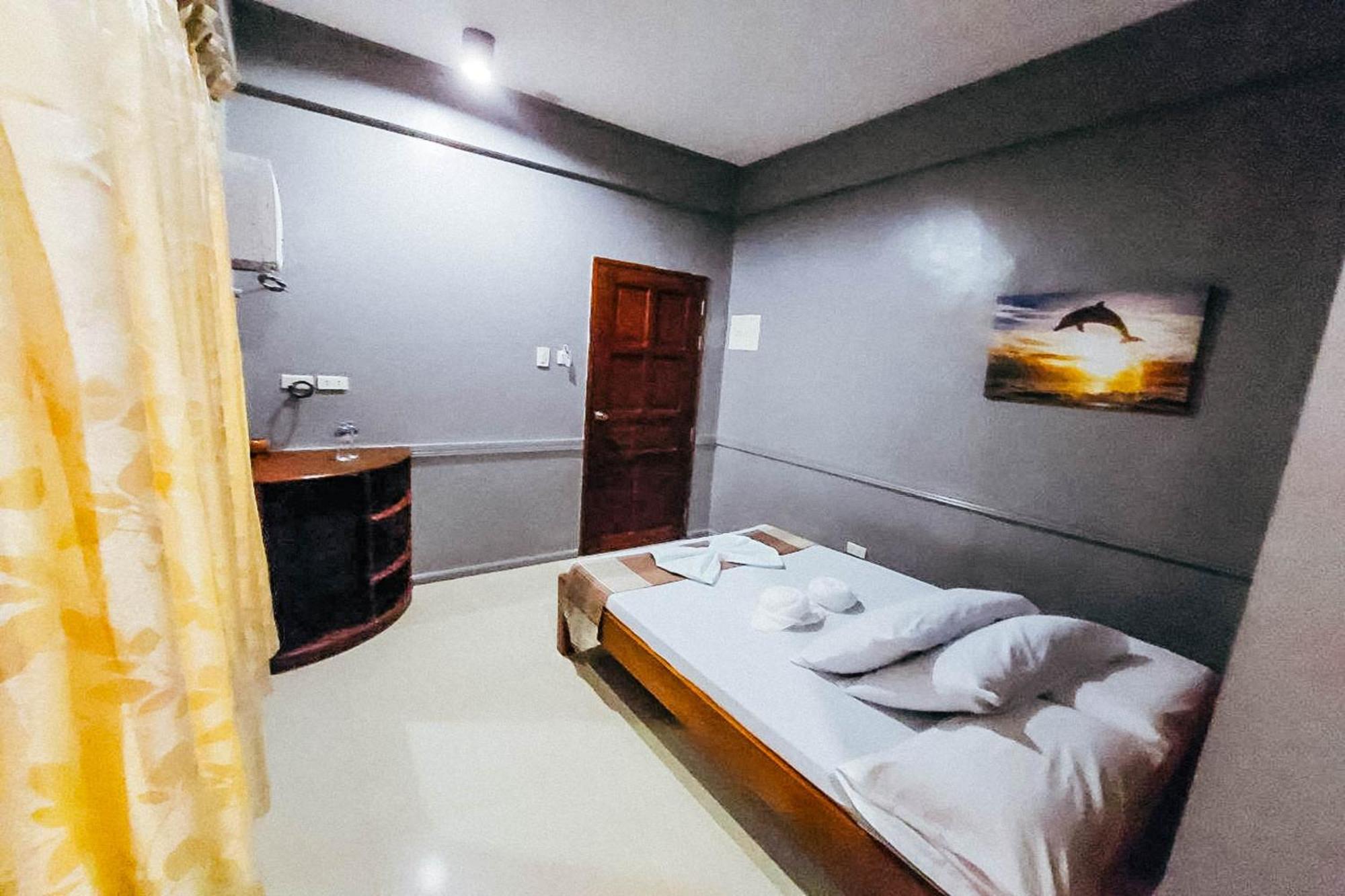Mbg Travellers Inn Powered By Cocotel بويرتو برينسيسا الغرفة الصورة