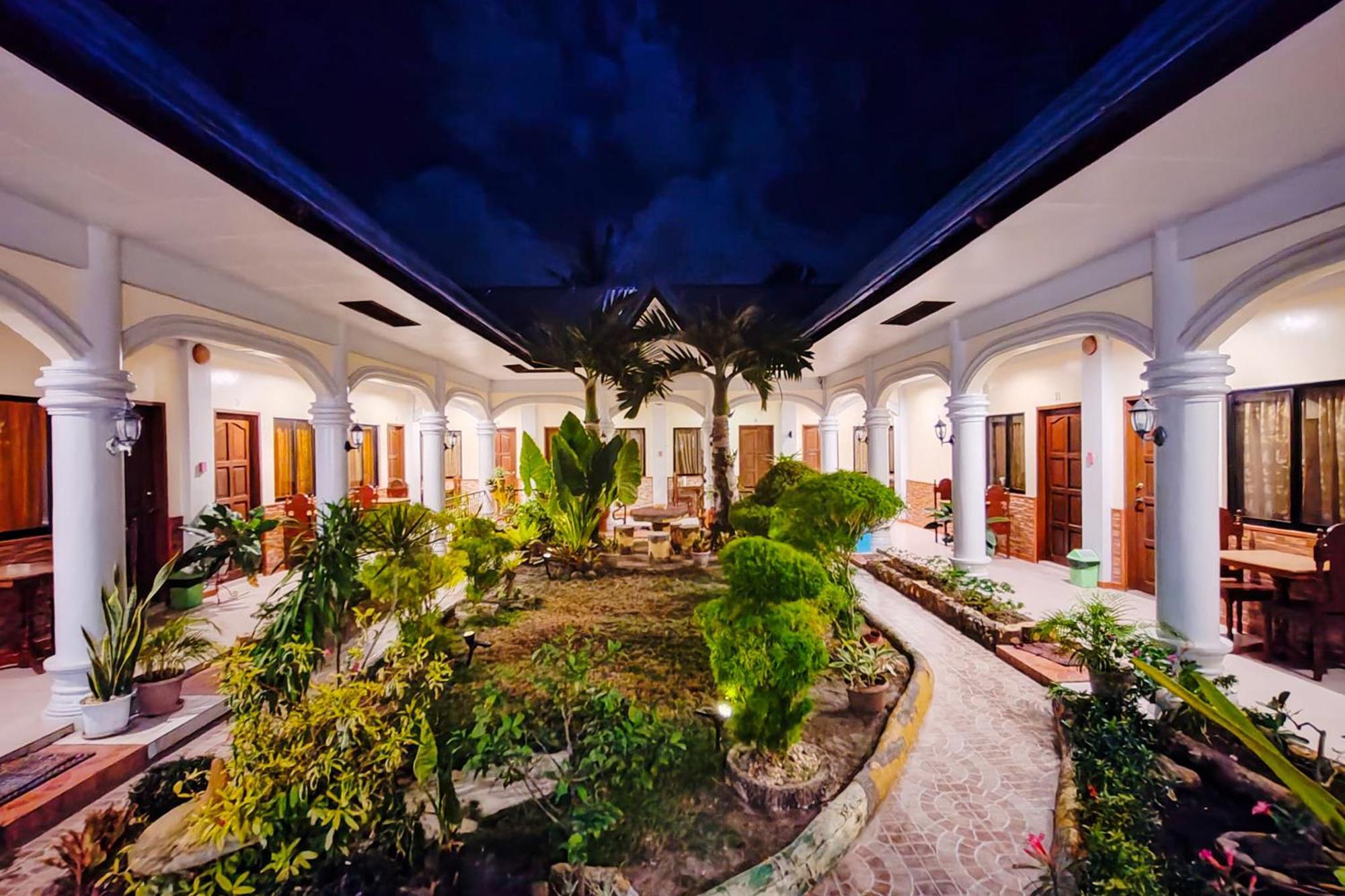 Mbg Travellers Inn Powered By Cocotel بويرتو برينسيسا المظهر الخارجي الصورة
