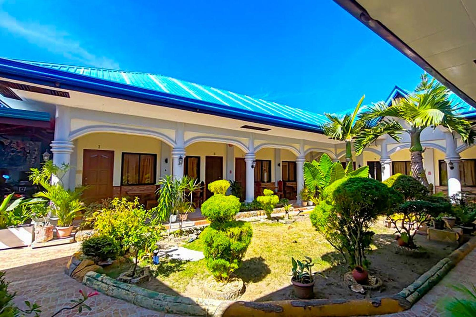 Mbg Travellers Inn Powered By Cocotel بويرتو برينسيسا المظهر الخارجي الصورة